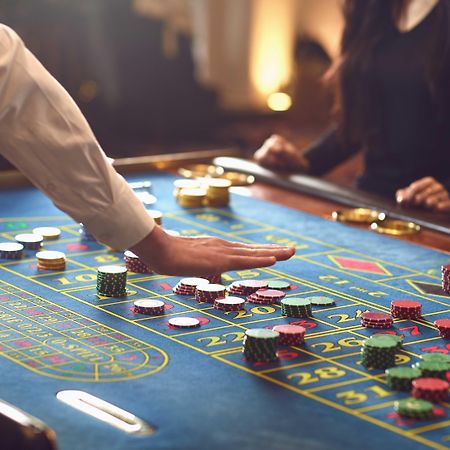 Porto Carras Meliton Hotel Neos Marmaras Exterior foto A casino croupier at a roulette table