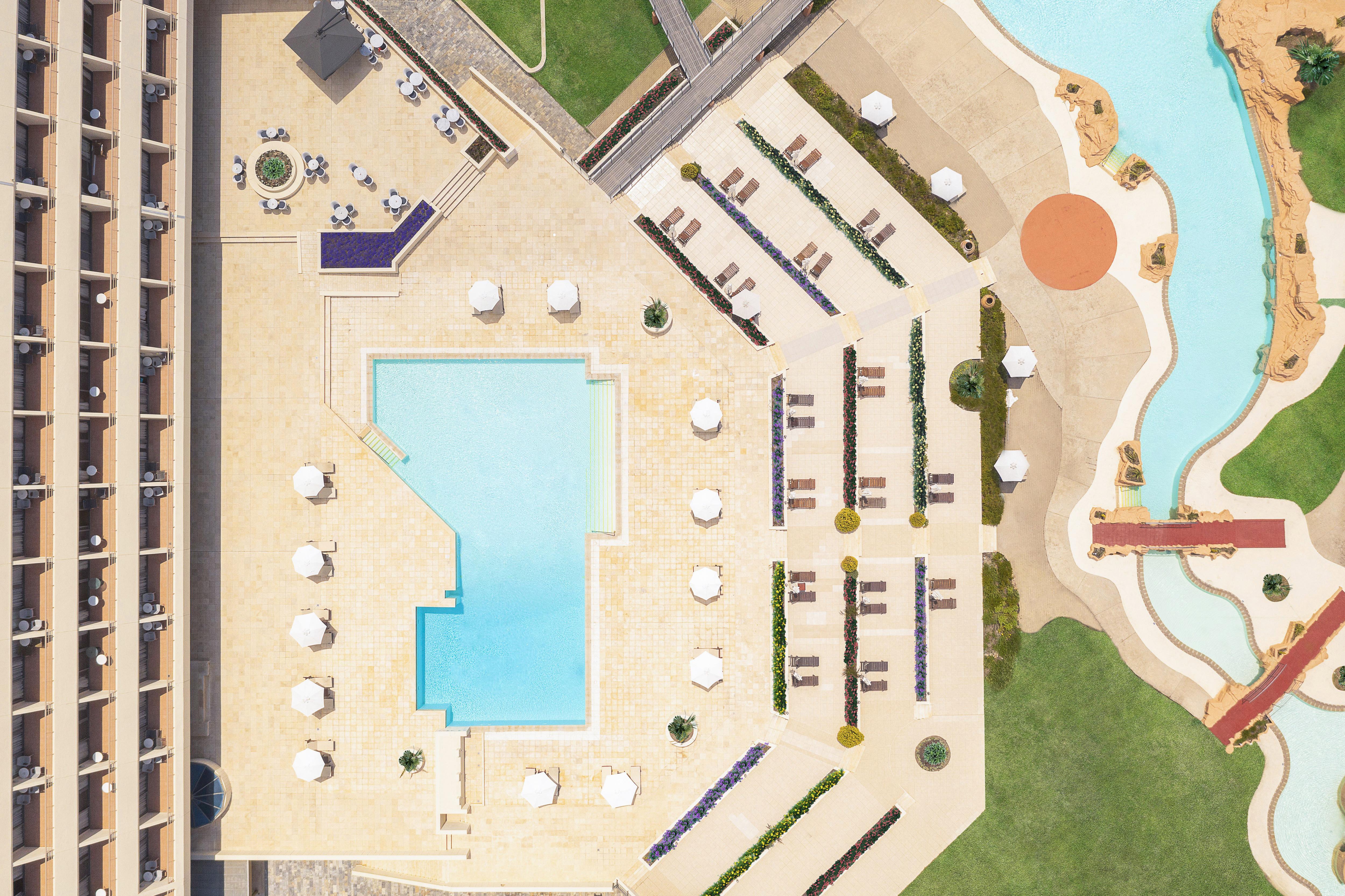 Porto Carras Meliton Hotel Neos Marmaras Exterior foto Aerial view of the pool at the Hotel