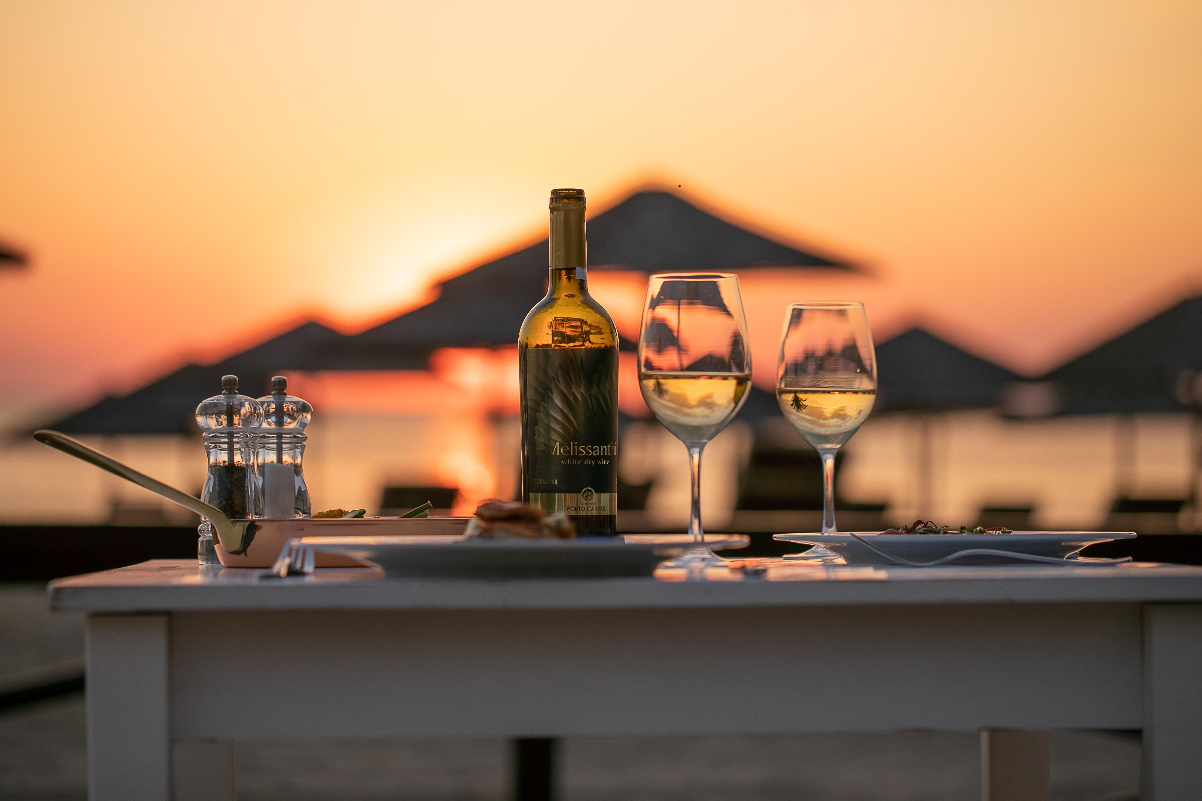 Porto Carras Meliton Hotel Neos Marmaras Exterior foto A bottle of wine
